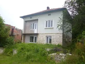 Big rural property with two houses & plot of land in village
