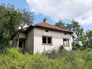 Old rural house with outbuildings and two big plots of regul