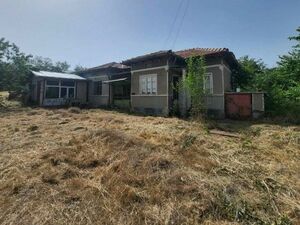 Solid brick house with two entrances with its own yard 