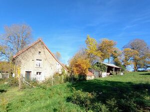 Characterful French cottage with outbuildings and garden.