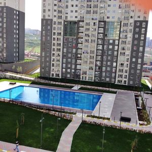 Furnished 1+1 compound apartment pool view for sale Istanbul
