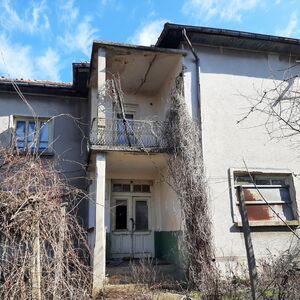 Country house with annex and land in village near big river